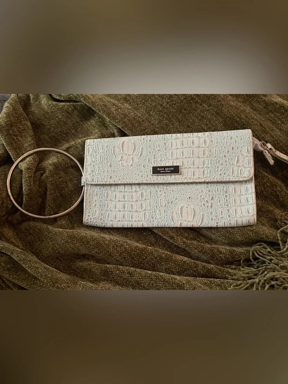 Kate Spade New York crocodile-embossed metal ring wristlet/clutch